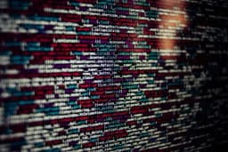 a close up of a computer screen filled with lots of code .